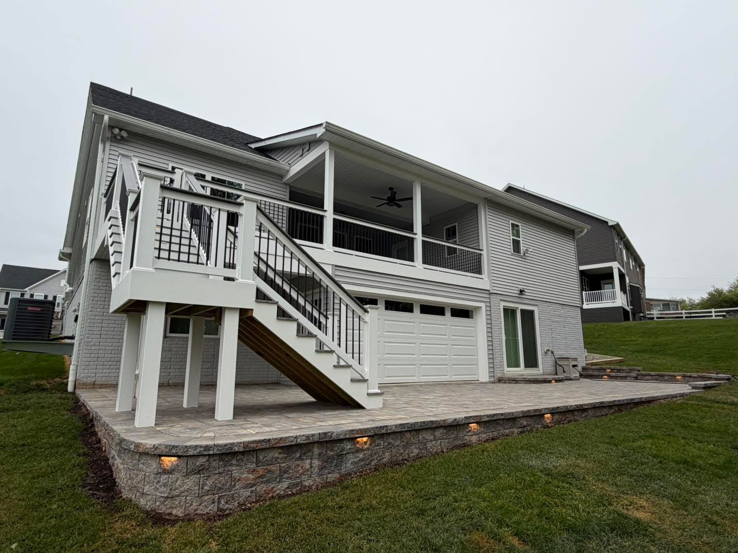 Covered deck with lit paver base